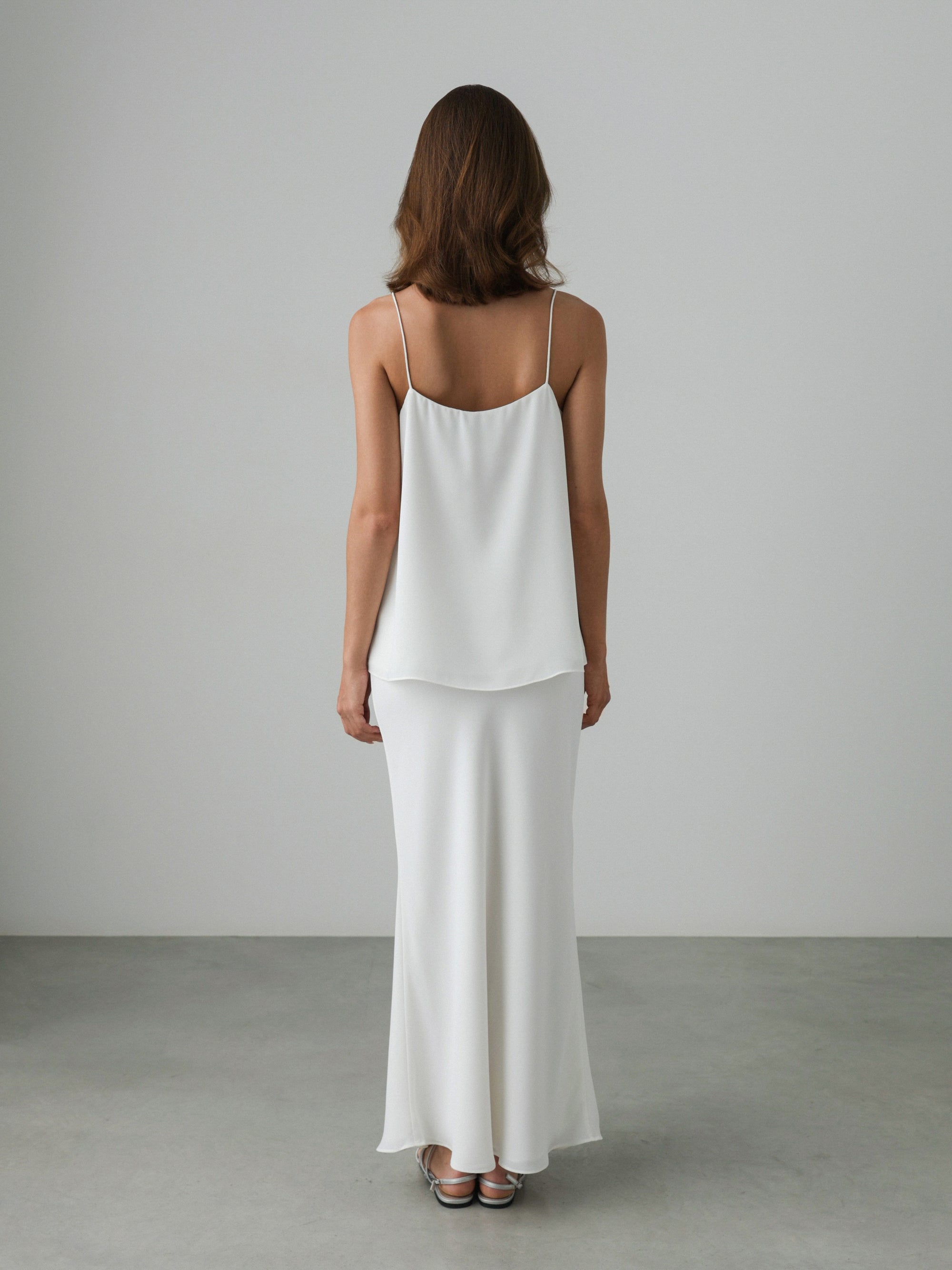 Essential Minimal Top