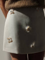 Cream Mini Skirt with Mother-of-Pearl Flower Details