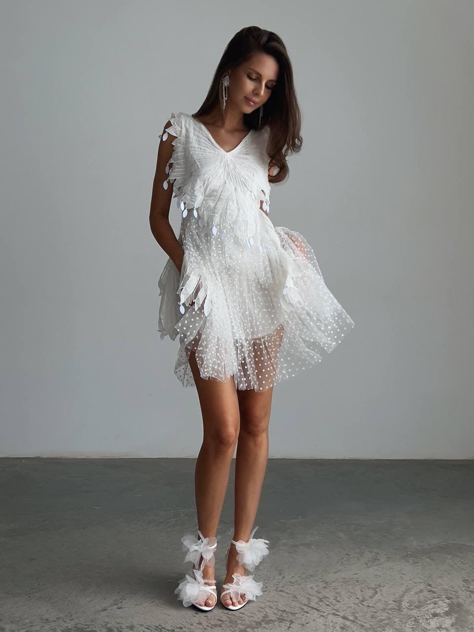 Elegant Feathered Mini Dress.