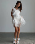 Elegant Feathered Mini Dress.