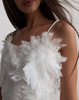 Feathered Elegance Mini Dress.